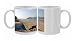 Bow of upturned boat and curious spaniel dog, Erme estuary, near Kingston Photo Mugs