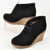 Stiefelette, mit Plateausohle und Keilabsatz in schwarz