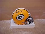 Brett Favre Hand Signed Autographed Green Bay Packers Riddell Football Mini Helmet w/ Photo of Signing