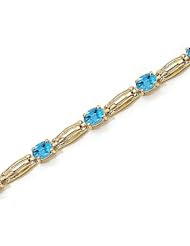 14kt Yellow Gold Oval Blue Topaz Bracelet.