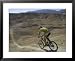 Back View of Competitior Riding Downhill in the Mount Sodom International Mountain Bi...