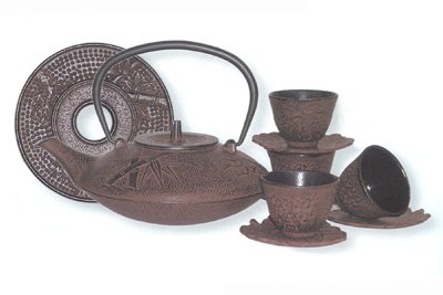 Reddish Brown Cast Iron Tea Set with 4 Cups and Leaf Design Saucers, 40 Oz Capacity