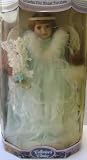 Genuine Fine Bisque Porcelain Doll - 17 inches tall - Collector's Edition - Limited Edition - Doll is an Angel dressed in baby blue dress - Hand Painted - Authentic Fabrics and Trimmings - Quality Hand Craftsmanship - Adjustable Display Stand - Certificate of Authenticity - ETMB