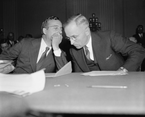 1938 photo Whispered advice. Washington, D.C., Oct. 14. Senator Harry Truman (right) of Missouri, wh