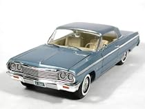 1964 Chevy Impala SS 409 diecast model car 1:18 scale die cast by Ertl 1 of 2500 - Light Blue