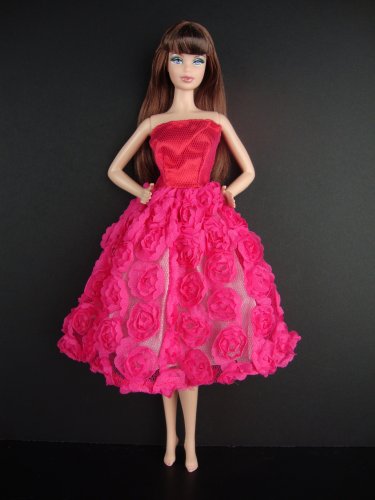 A Hot Pink Knee Length Dress Covered in Roses It so Cute Also Avail in Silver, Red, and Purple Made to Fit the Barbie Doll