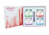 Sex in the City Women Metro Collection Perfume Gift Set with Lust 3.4oz Eau De Parfum. Love 3.4oz Eau De Parfum, Kiss 3.4oz Eau De Parfum and Dream 3.4oz Eau De Parfum