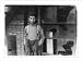 Historic Print (L): Eleven-year-old bakery worker Glenn Dungey. See Ellis Report, L.W. Hine. Location: Oklah