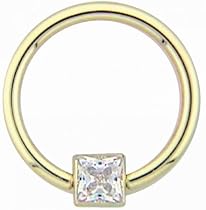 14 karat gold captive ring with clear square CZ