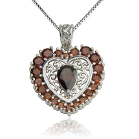 Sterling Silver Garnet Heart-Shaped Pendant by Amazon.com Collection