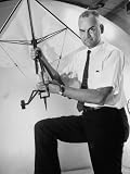 Inventor and NASA Scientist Francis M. Rogallo Holding Flexible Wing Used in Space Vehicle Recovery Photographic Poster Print by Alfred Eisenstaedt, 30x40