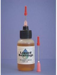 Toy: Liquid Bearings, superior 100%-synthetic oil for swingsets and all back yard gym equipment, never gums up, frees rusty and sticky mechanisms, immediately quiets annoying squeaky swings!! - Liquid Bearings