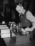 1939 December 14. Machine signs 7,000 social security checks per hour with no writer's cramp. Washin