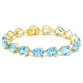 Yellow Gold Overlay Sterling Silver Blue Topaz Pear-Shaped Bracelet, 7.25 by Amazon.com Collection