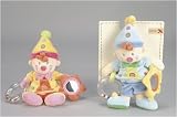 Eigenschaften Nicotoy / Nicotoy Baby Multi Puppe Clown rosa/gelb