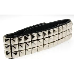 Click here to buy 3 Rows of Pryamid Shaped Studs Leather Wrist Band Bracelet. by Toltec Trading Company.