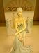 broadway belles - lady sitting in chair figurine