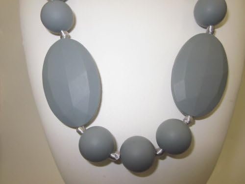 Chewable Teething Necklace for Teething Babies or Nursing Moms. Strand of 14mm Dark Gray Beads with 4 Faceted 25 X 40mm Dark Gray Oval Beads Alternating with 14mm Beads in the Center. Soft Silicone Food Safe Beads. BPA Free Non Toxic. Gift Box Included for Easy Gift Giving.