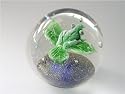 Green frog on leaf paperweight