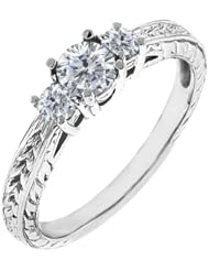 0.54 Ct Round G/H SI1 Diamond 18K White Gold 3-Stone Ring
