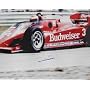 Mario Andretti - Budweiser Car Left - Autographed 16x20 Photograph