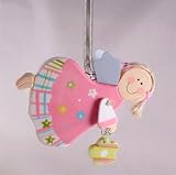 Pink jumping guardian angel on spring