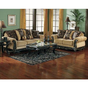 The warm tones of the upholstery are ...