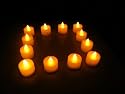 12 Yellow LED Tea Lights Battery Operated Candles