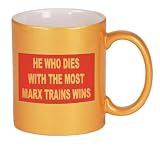 HE WHO DIES WITH THE MOST MARX TRAINS WINS Coffee Mug in Metallic Colors