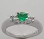 Platinum Three Stone Emerald and Diamond Engagement Ring