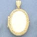 14kt Gold Locket Holds Four Photos