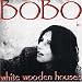 Bobo in White Wooden Houses