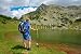 Wallmonkeys Peel and Stick Wall Decals - Hiker at Prevalski Lake in National Park Pirin, Bulgaria - Removable Graphic