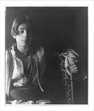 Historic Print (XL): [Kahlil Gibran in Middle Eastern(?) costume with leopard skin and staff, seated]