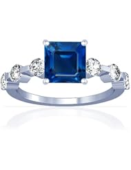 Platinum Emerald Cut Blue Sapphire Ring With Sidestones