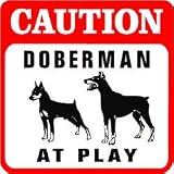 CAUTION: DOBERMAN AT PLAY dog warn sign