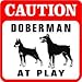 CAUTION: DOBERMAN AT PLAY dog warn sign
