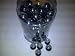 TBC Decorative Marbles: Silvery Black 100% Glass, Marbles. Use in Floral Arrangements, with Candles, Aquariums, Wet or Dry. Great for an Eye Catching Centerpiece with Led Lights. Can Also Be Used in Games. Approx 75 Marbles Per Container