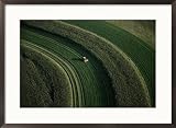 Aerial view of a tractor on curved fields Framed Art Poster Print by Paul Chesley, 29x21 Image