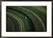 Related Aerial view of a tractor on curved fields Framed Art Poster Print by Paul Chesley, 29x21 Image