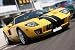 Wallmonkeys Peel and Stick Wall Decals - Super Car at Race Circuit - Removable Graphic