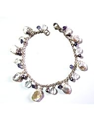 White freshwater pearl petals and aquamarine aterling silver bracelet.