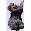Yvette, the cub in the tree statue wildlife garden bear
