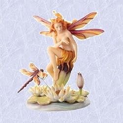 A fairy and her dragonfly statue home office sculpture