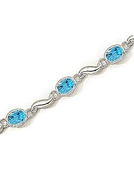 14kt Yellow Gold Oval Blue Topaz and Diamond Bracelet