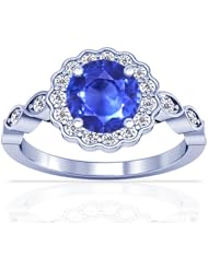 Platinum Round Cut Blue Sapphire Ring With Sidestones