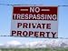 Bullet Holes Effectively Punctuate a Warning Sign Photographic Poster Print, 24x18