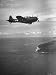 F-6 Hellcat Fighter Plane over Tanahmera Bay as Japanese Airfields at Hollandia, New ...