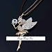 Chaine collier fantaisie pendentif fée clochette couleur or strass transparent
