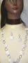 Multi Size Round White Color Beads Separated By Metallic Rings Medium Chain Necklace Earrings